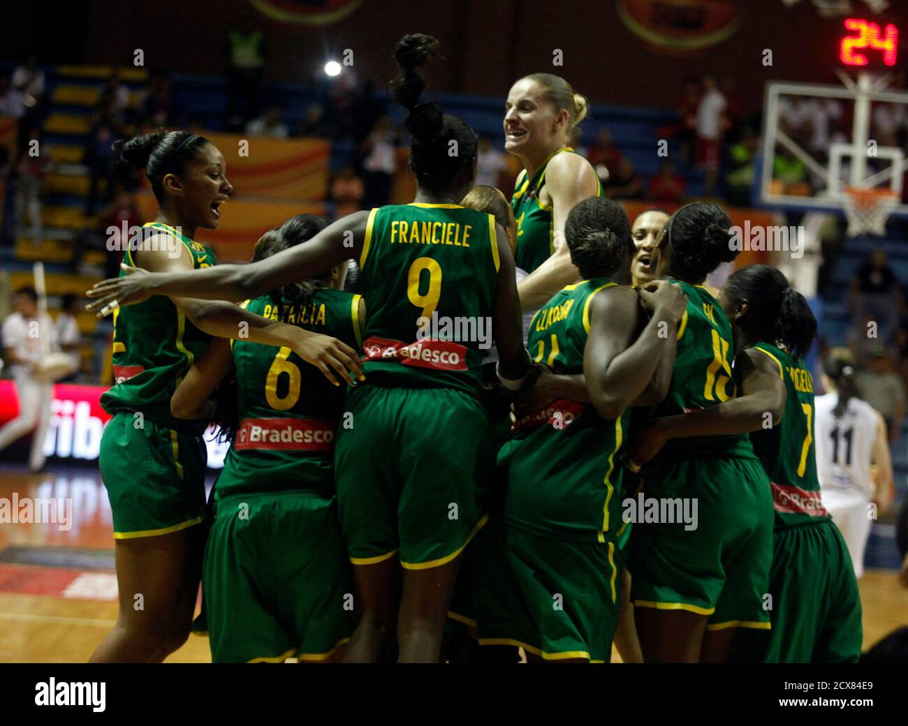 Brazil's team celebrates after defeating Argentina in the final round of the FIBA Americas Championship for Women in Neiva October 1, 2011. REUTERS/John Vizcaino (COLOMBIA - Tags: SPORT BASKETBALL) Stock Photo