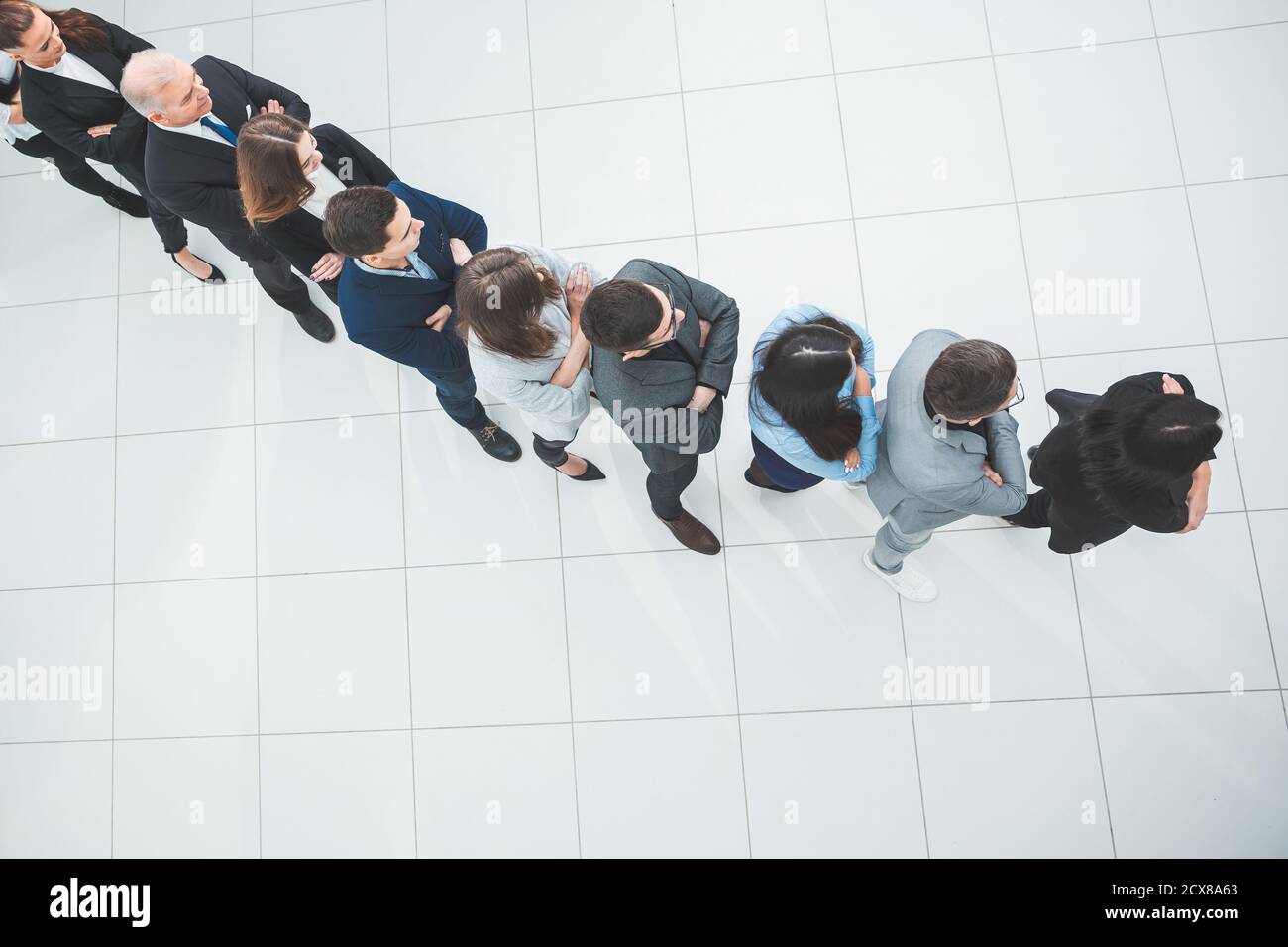 group of diverse business people standing in a queue Stock Photo - Alamy