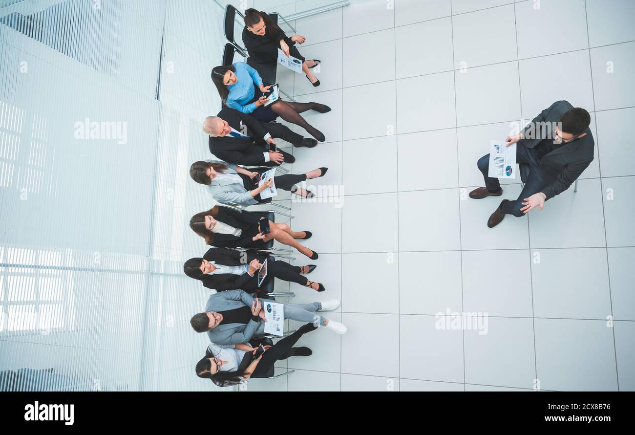 top view. the Manager and employees discuss financial data Stock Photo