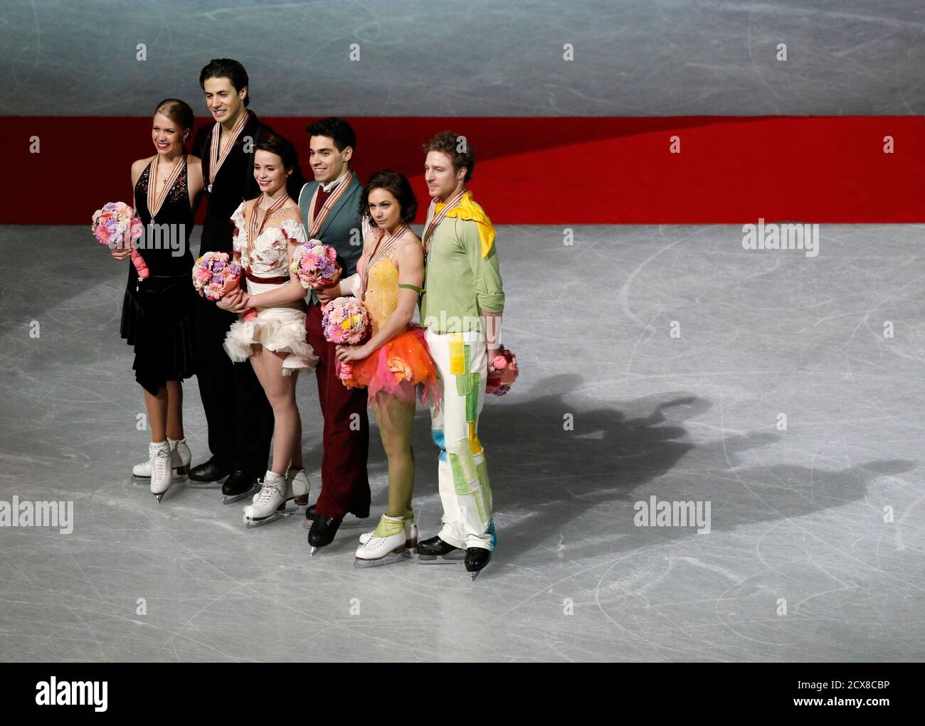 Gold medallists Anna Cappellini and Luca Lanotte (3rd R) of Italy pose with  silver medallists Kaitlyn Weaver (L) and Andrew Poje (2nd L) of Canada, and  bronze medallists Nathalie Pechalat (2nd R)