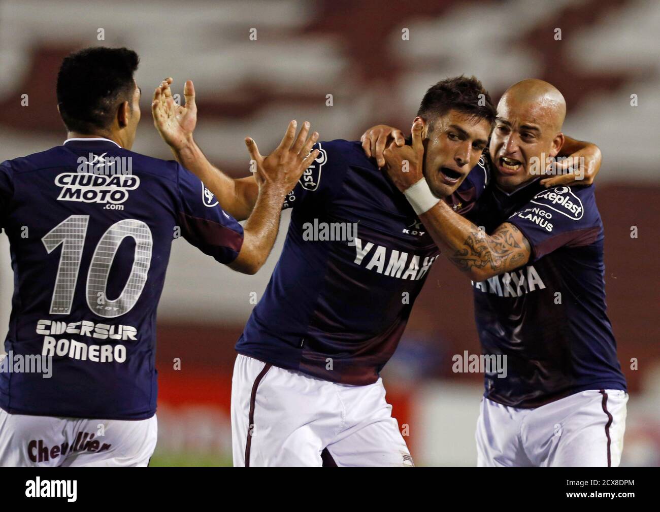 Diego Braghieri C Of Argentina S Lanus Is Congratulated By Teammates Santiago Silva R And Silvio Romero After He Scored Against Paraguay S Cerro Porteno During Their Copa Sudamericana Soccer Match In Buenos Aires