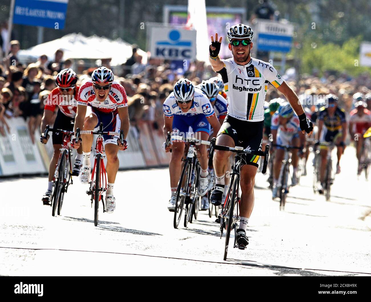 Htc Highroad Rider Mark Cavendish Of Britain Celebrates Crossing The Finishing Line Of The 99th Scheldeprijs Grand Prix De L Escaut Cycling Race In Schoten April 6 2011 Reuters Yves Herman Belgium Tags Sport Cycling