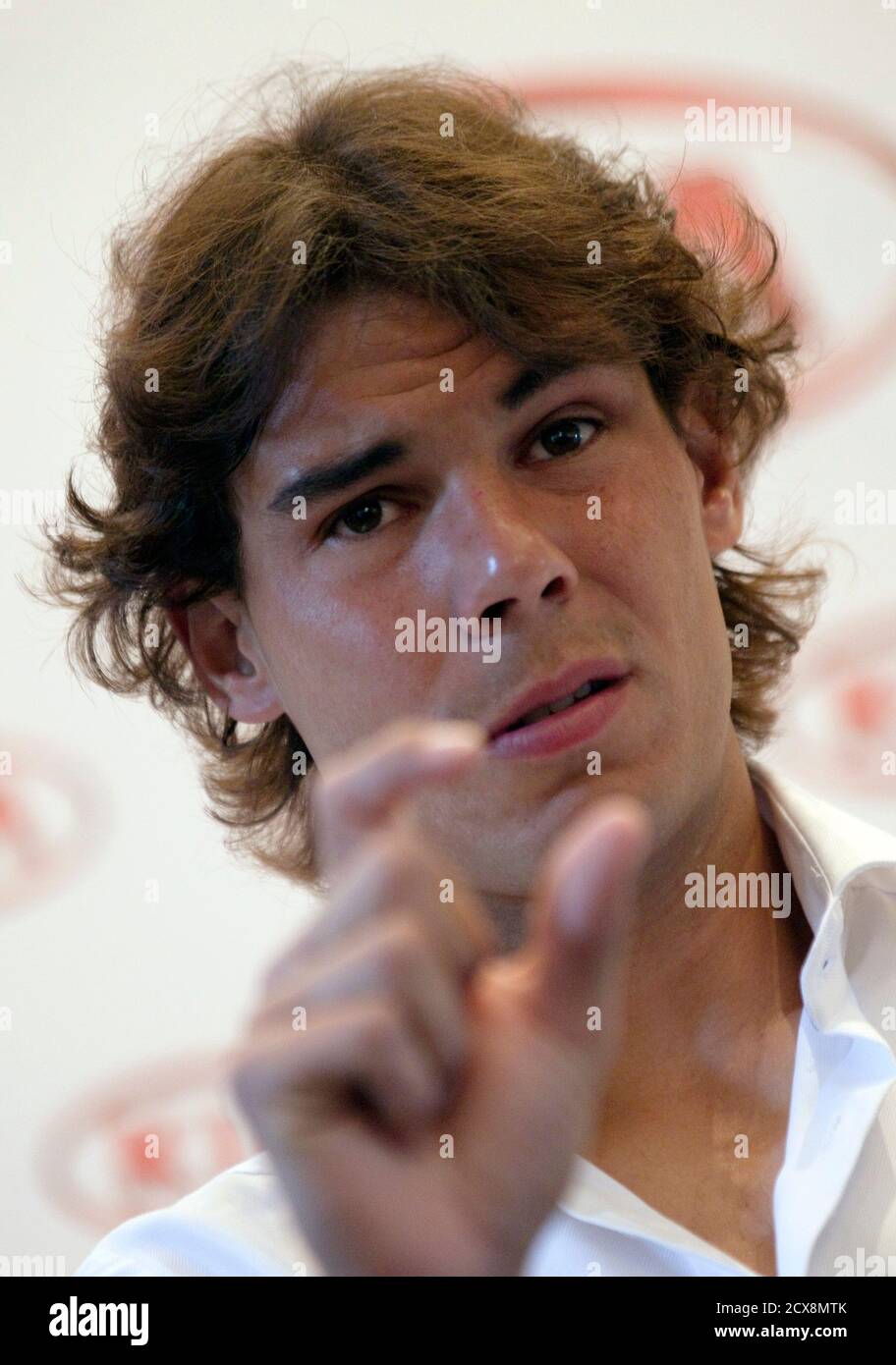 Spain S Rafael Nadal Gestures During A News Conference In Madrid May 4 2012 Winning A Gold