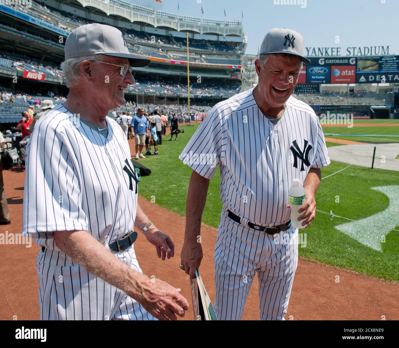 Former manager Lou Piniella and San Diego Padres announcer Jerry Coleman  (L) enjoy a laugh before the Old Timer's Day ceremonies before the New York  Yankees play the Chicago White Sox in