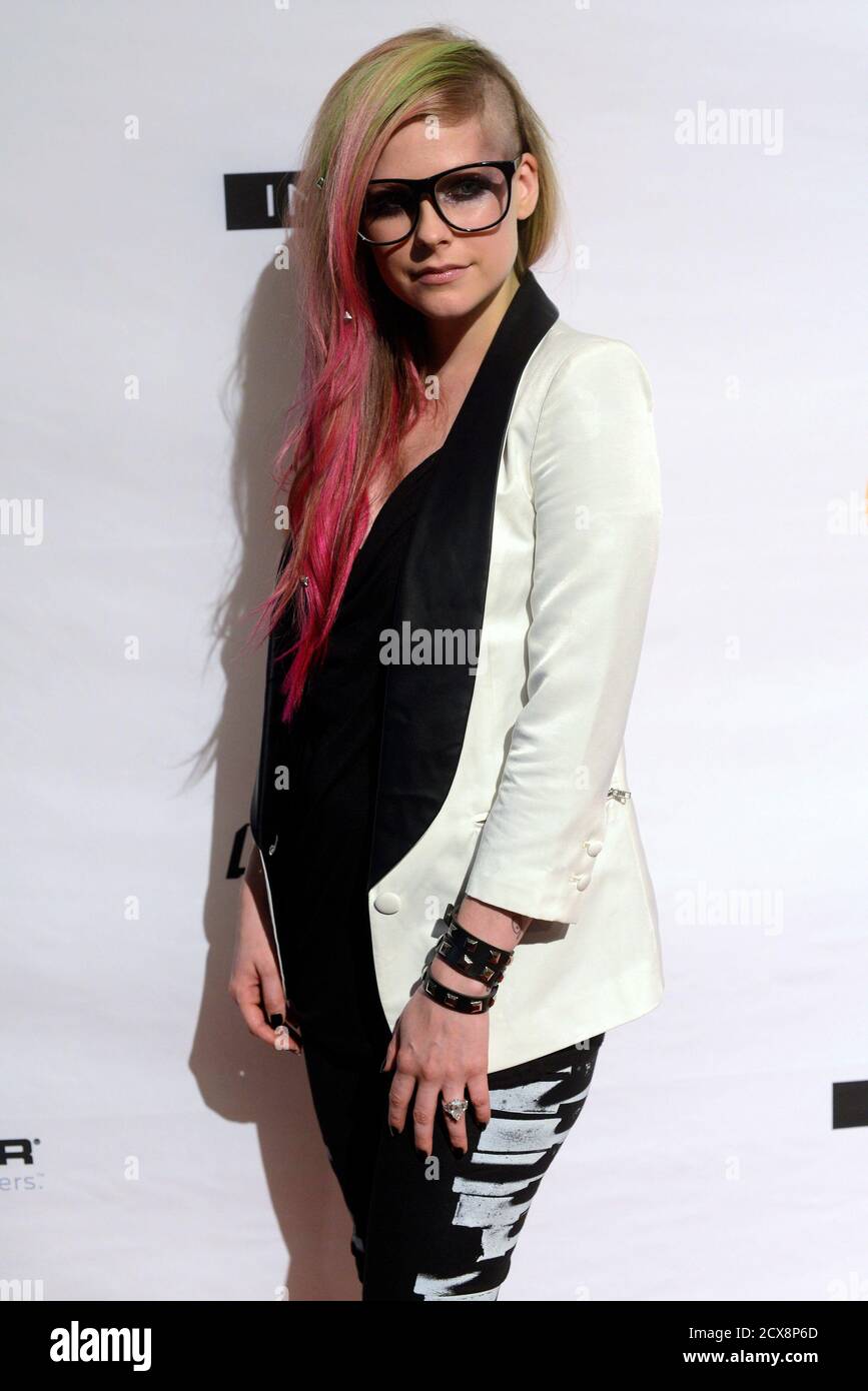Pop Singer And Designer Avril Lavigne Poses For Photographers After The Presentation Of Her Abbey Dawn Spring Summer 13 Collection During New York Fashion Week September 10 12 Reuters Keith Bedford United States