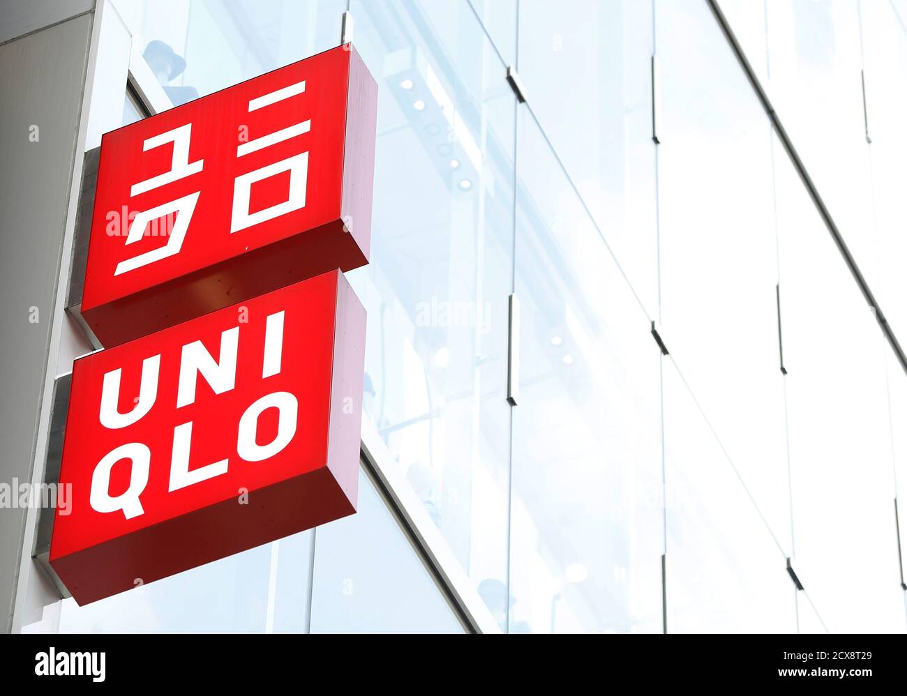 The logo of Fast Retailing's Uniqlo is seen in Tokyo April 10, 2013. Fast  Retailing, Asia's biggest apparel company, left its full-year operating  profit forecast unchanged despite a jump in sales in