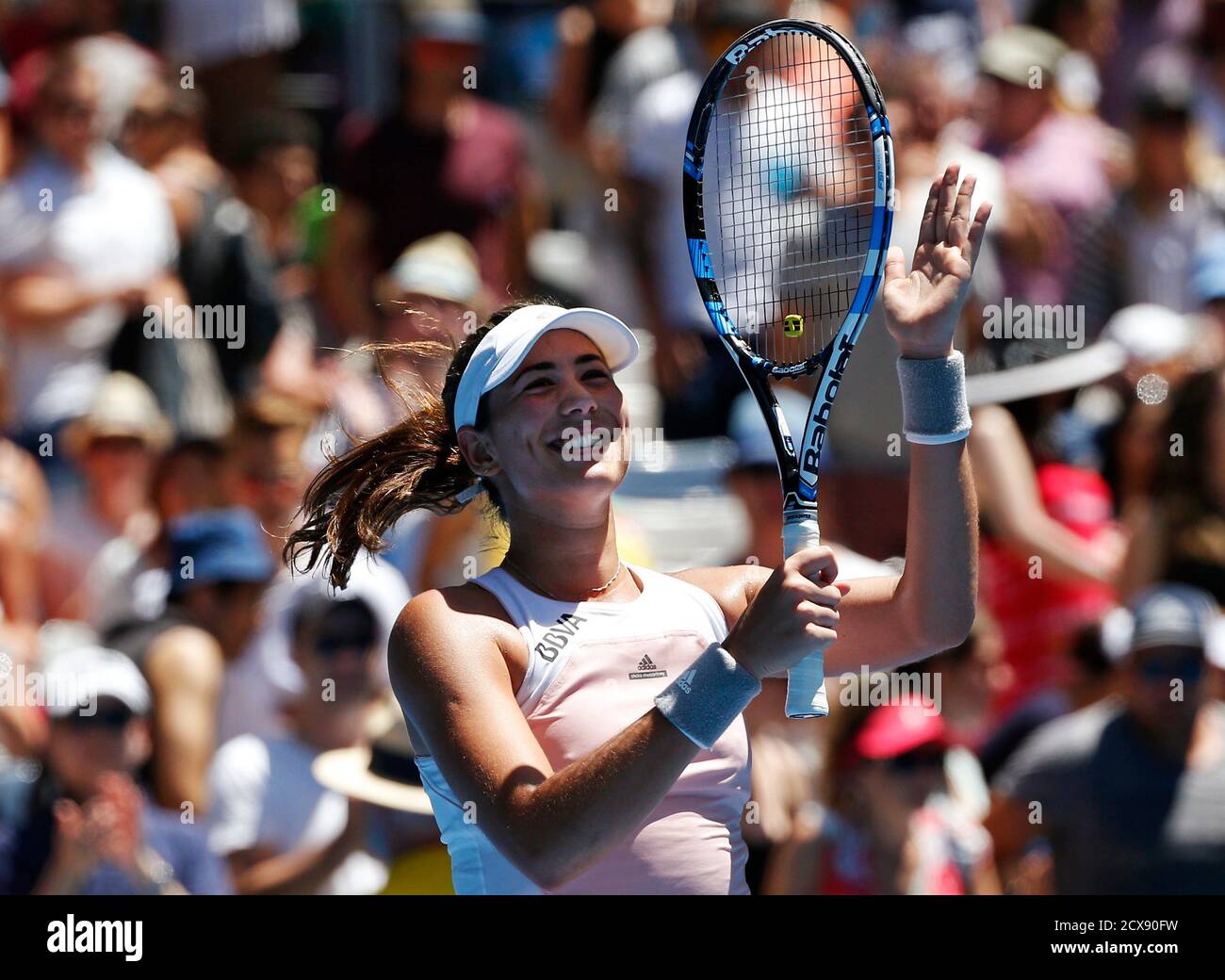 Garbine Muguruza of Spain celebrates defeating Timea Bacsinszky of  Switzerland in their women's singles third round match at the Australian  Open 2015 tennis tournament in Melbourne January 24, 2015. REUTERS/Athit  Perawongmetha (AUSTRALIA -