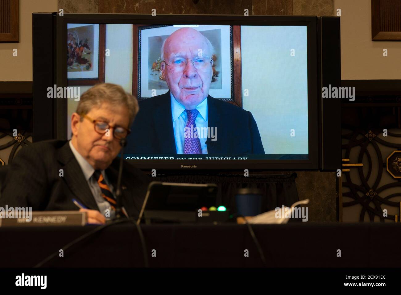 United States Senator Patrick Leahy (Democrat of Vermont), speaks remotely during a hearing in Washington, DC, U.S., on Wednesday, Sept. 30, 2020. The committee is exploring the Federal Bureau of Investigations investigation of the 2016 Trump campaign and Russian election interference. US Senator John Neely Kennedy (Republican of Louisiana) is in the foreground at left.Credit: Stefani Reynolds/Pool via CNP /MediaPunch Stock Photo