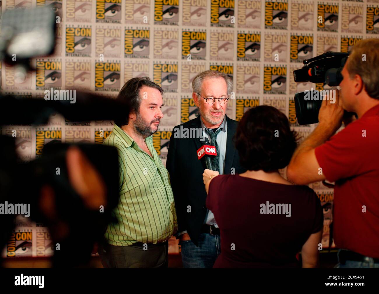 Director Steven Spielberg and film producer Peter Jackson (L) are interviewed about their upcoming motion picture 'The Adventures of Tin Tin' at the pop culture event Comic Con in San Diego, California July 22, 2011.   REUTERS/Mike Blake  (UNITED STATES - Tags: ENTERTAINMENT SOCIETY PROFILE) Stock Photo