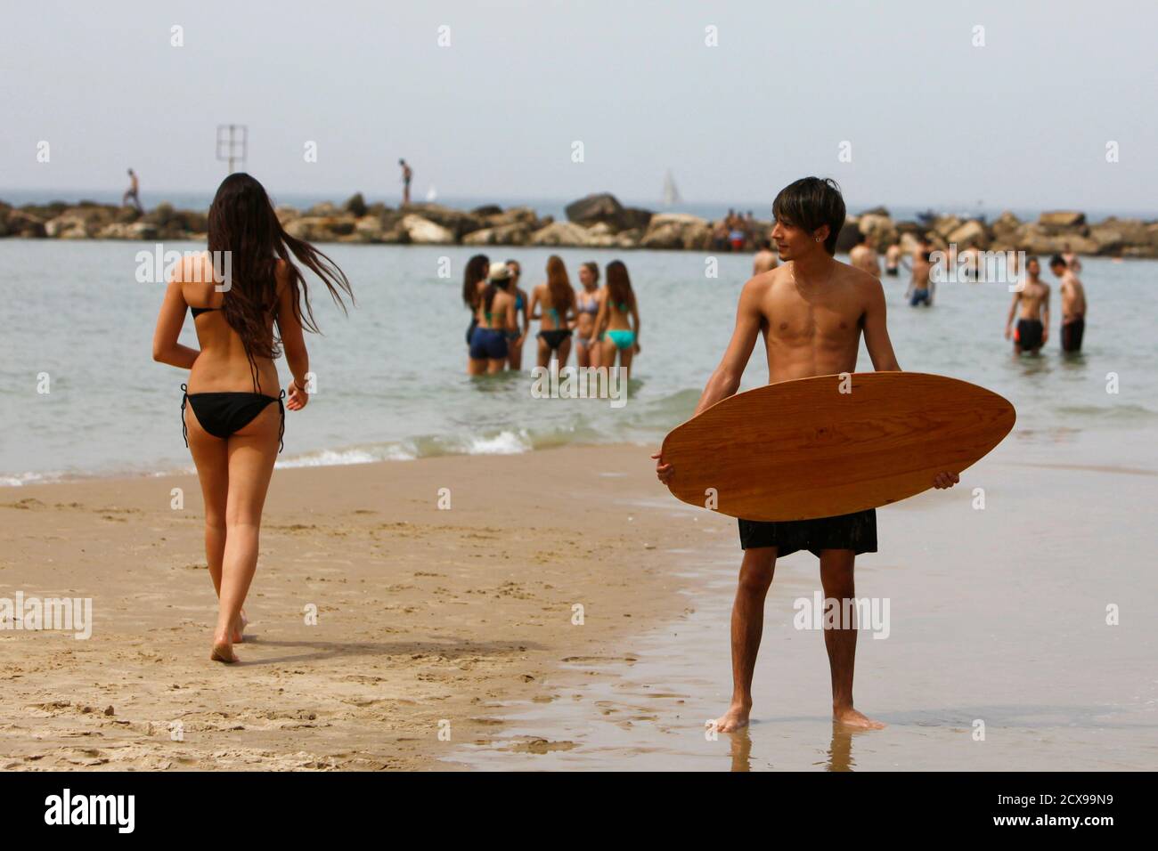 Israelis Cool Off At The Beach In Tel Aviv March 15 2013 Unusually Hot Weather Has Hit Israel In The Last Few Days With Temperatures Reaching 33 Degrees Celsius 91 Degrees Fahrenheit