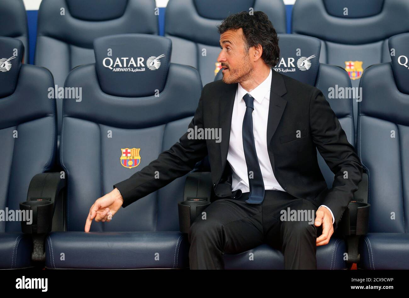 FC Barcelona's new coach Luis Enrique Martinez gestures to the bench after  signing a two-year contract at Camp Nou stadium in Barcelona May 21, 2014.  REUTERS/Albert Gea (SPAIN - Tags: SPORT SOCCER