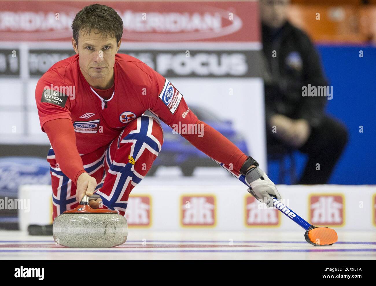 norway-skip-thomas-ulsrud-delivers-a-rock-against-china-during-the-second-draw-of-the-world-men-s-curling-championships-in-halifax-nova-scotia-march-28-2015-reuters-mark-blinch-stock-photo-alamy