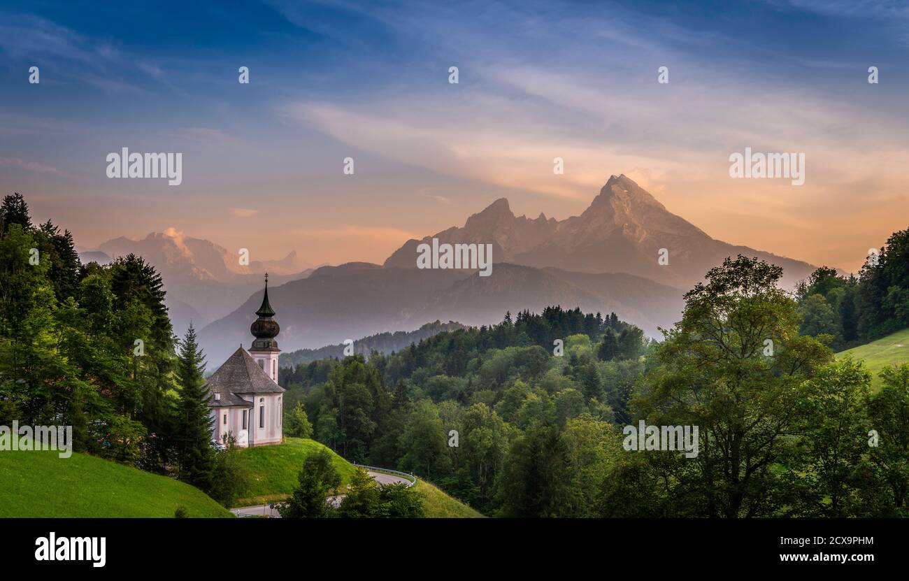 The beautifully located Maria Gern church, with the magnificient Alps in the background Stock Photo