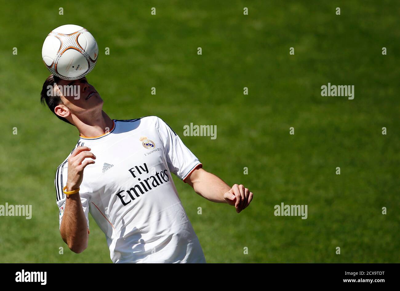 Gareth Bale Of Wales Heads The Ball During His Presentation As A New Real Madrid Player At The Santiago Bernabeu Stadium In Madrid September 2 13 Thousands Of Real Madrid Fans Flocked