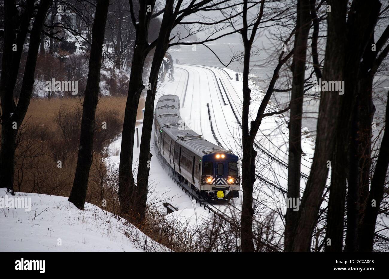 A Metropolitan Transportation Authority Mta Metro North Railroad Commuter Train Travels North Along The East Shore