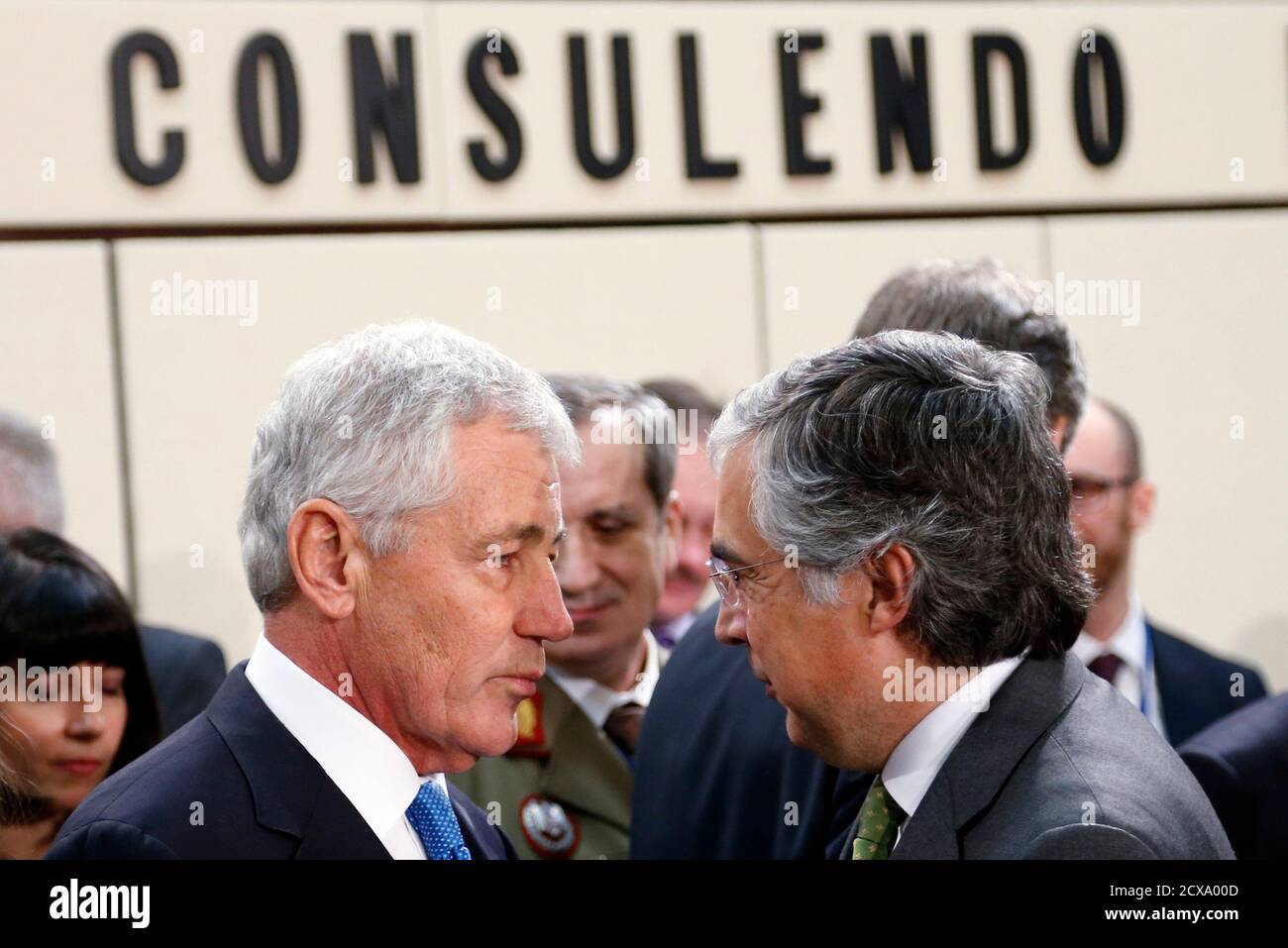 U S Defense Secretary Chuck Hagel Listens To Portugal S Defence Minister Jose Pedro Aguiar Branco R During A Nato Georgia Defence Ministers Meeting At The Alliance Headquarters In Brussels February 5 15 Nato Defence Ministers