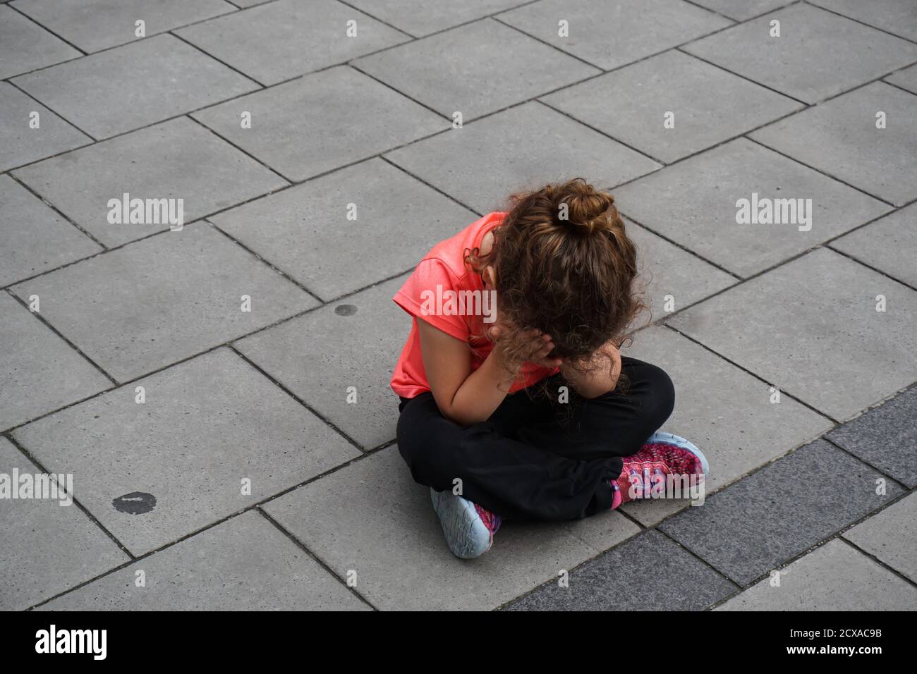 Girl head in hands sad hi-res stock photography and images - Alamy