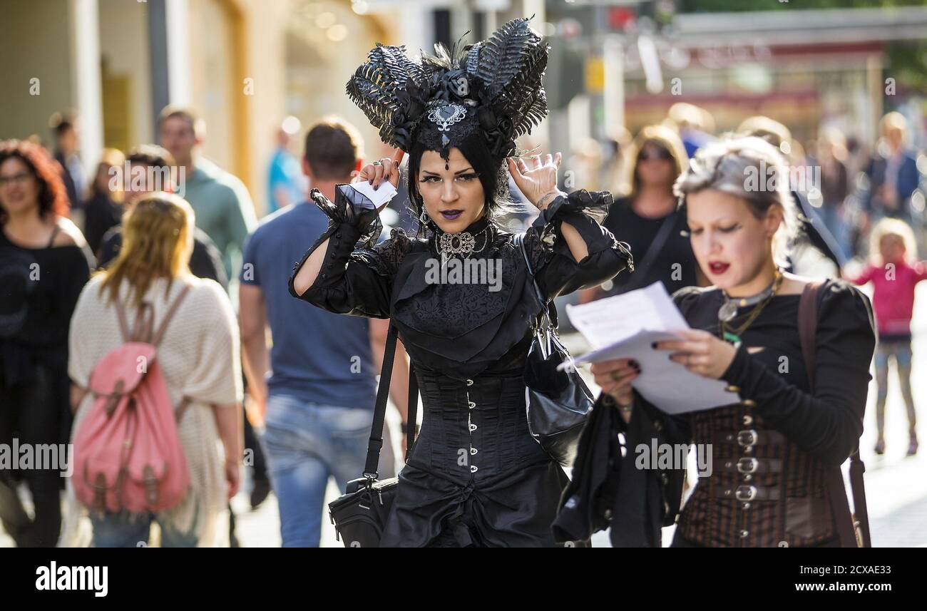 Participants of the Wave and Goth festival walk through the downtown  pedestrian zone in Leipzig, Germany, May 22, 2015. The annual festival,  known in Germany as Wave-Gotik Treffen (WGT), features over 100