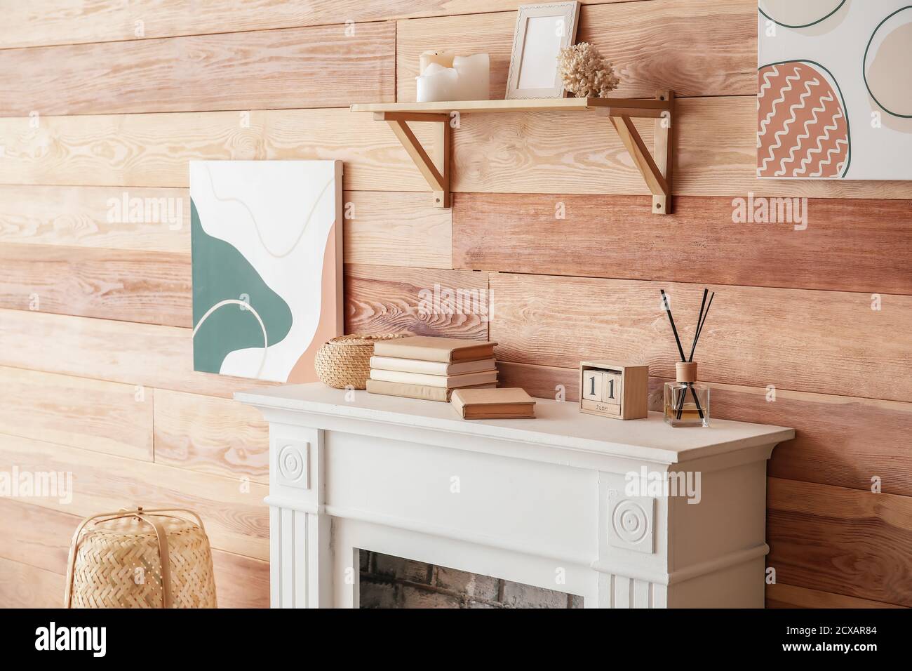 Modern fireplace near wall in room Stock Photo Alamy