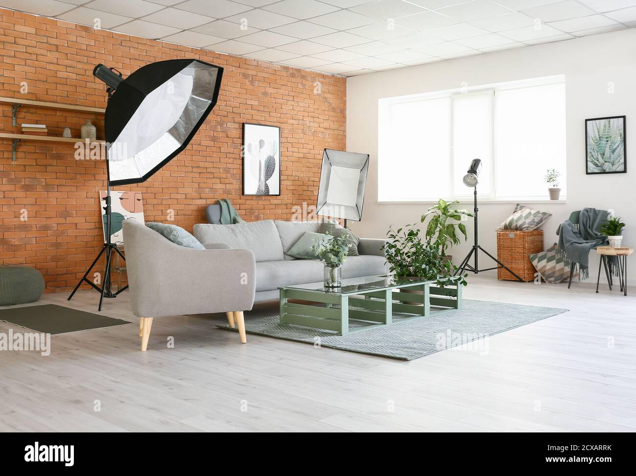 Interior of photo studio with modern equipment and furniture Stock ...
