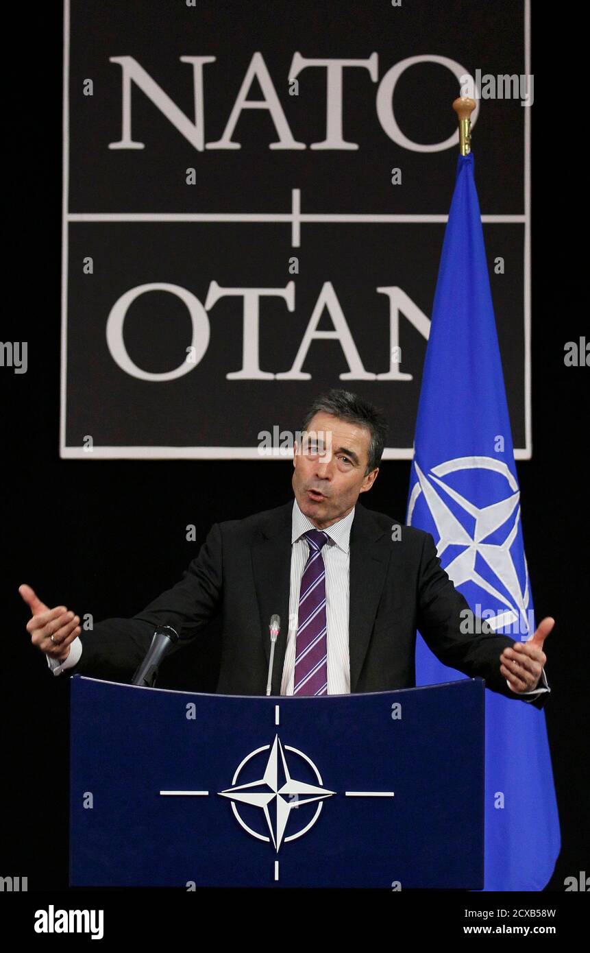 NATO Secretary General Anders Fogh Rasmussen holds a news conference during a NATO defence ministers meeting (NAC) at the Alliance headquarters in Brussels March 10, 2011. NATO defence ministers meeting in Brussels on Thursday and Friday will discuss options to respond to the turmoil in Libya, including a possible no-fly zone, the officials said.      REUTERS/Yves Herman (BELGIUM - Tags: POLITICS CIVIL UNREST MILITARY) Stock Photo