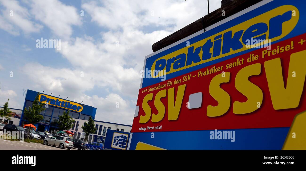 On sale advertisments are seen at the entrance of a German do-it-yourself retailer Praktiker in Munich July 11, 2013. Praktiker said its main home improvement store business in Germany has filed for insolvency on Thursday. The company said that the directors of the businesses that operate Praktiker and extra-BAU+HOBBY stores in Germany asked a Hamburg court to open insolvency proceedings on grounds of over-indebtedness.   REUTERS/Michael Dalder   (GERMANY - Tags: BUSINESS) Stock Photo
