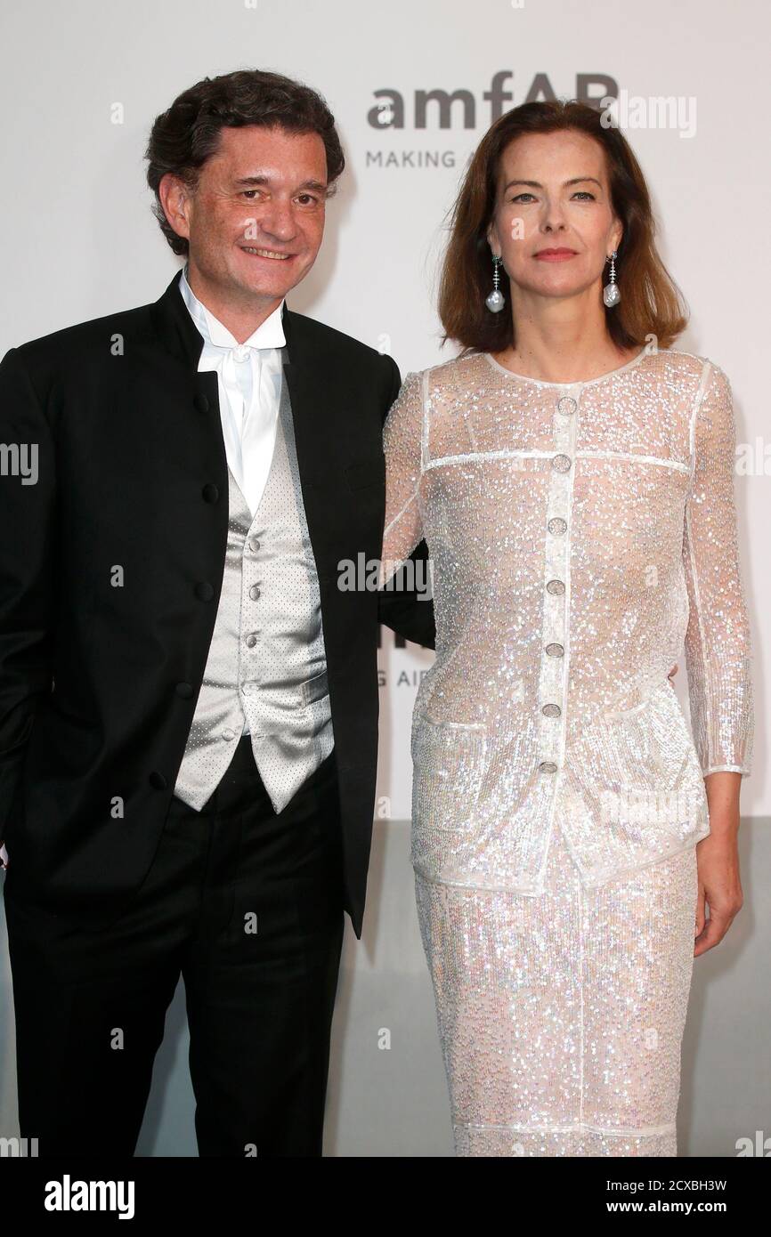 Actress Carole Bouquet (R) and Philippe Sereys de Rothschild arrive for