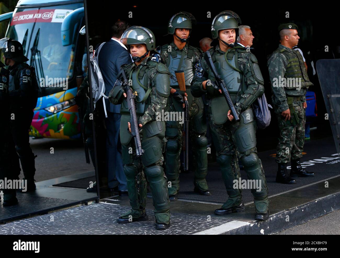 Brazilian army personal stand guard as the England team arrives at their team hotel in Rio de Janeiro June 8, 2014. REUTERS/Eddie Keogh (BRAZIL - Tags: SPORT SOCCER WORLD CUP) Stock Photo