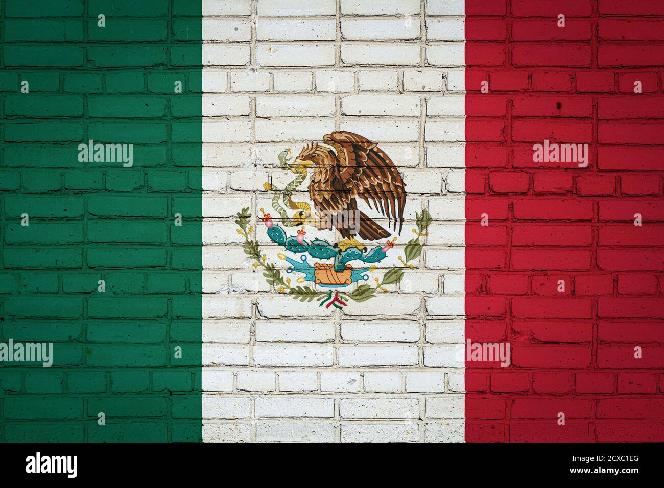 National flag of Mexico depicting in paint colors on an old brick wall ...