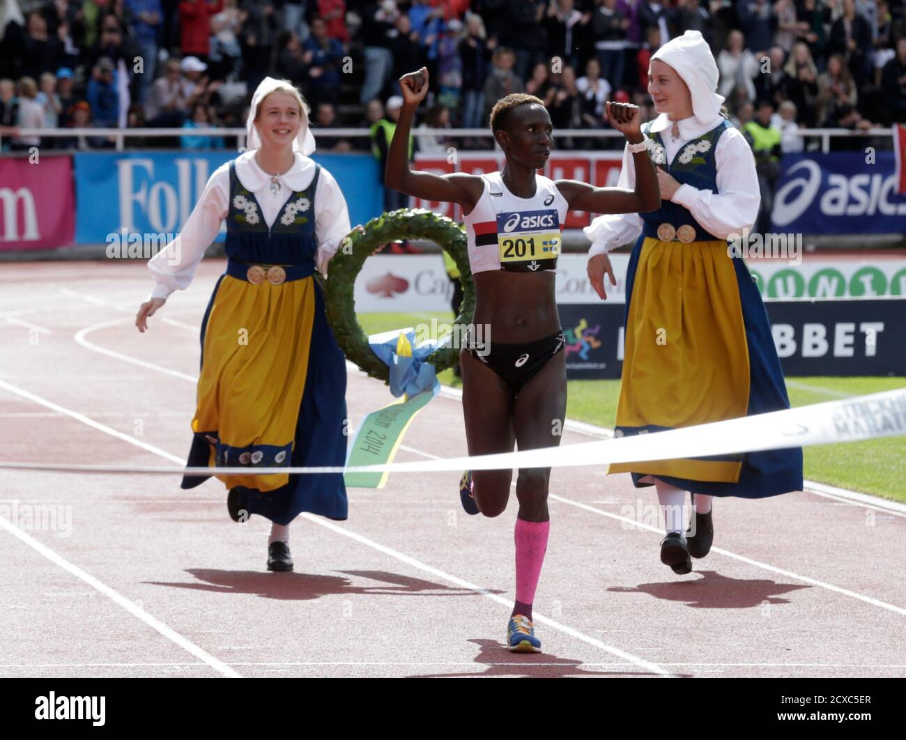 Isabellah Andersson of Sweden runs to win the Stockholm marathon May 31,  2014. According to organizers,