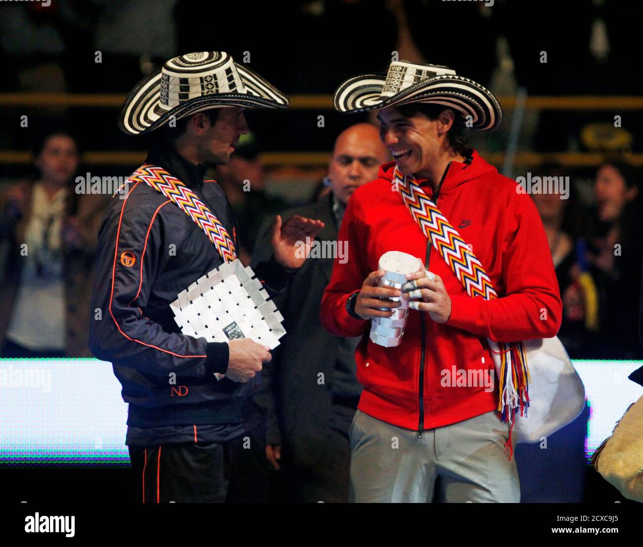 Tennis players Rafael Nadal (R) of 