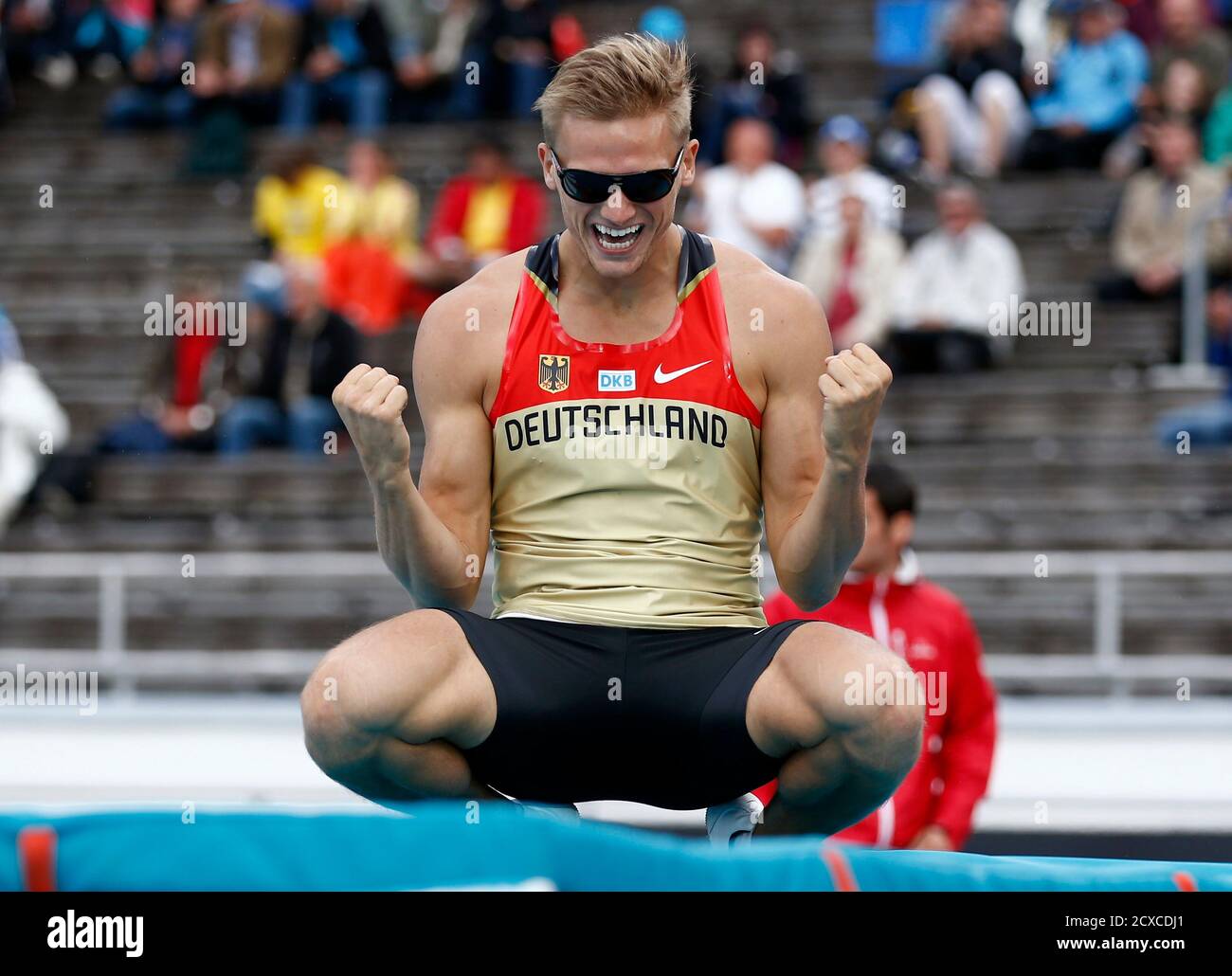 Pascal Behrenbruch of Germany reacts after clearing the bar during the pole  vault event of the men's decathlon at the European Athletics Championships  in Helsinki June 28, 2012. REUTERS/Dominic Ebenbichler (FINLAND -