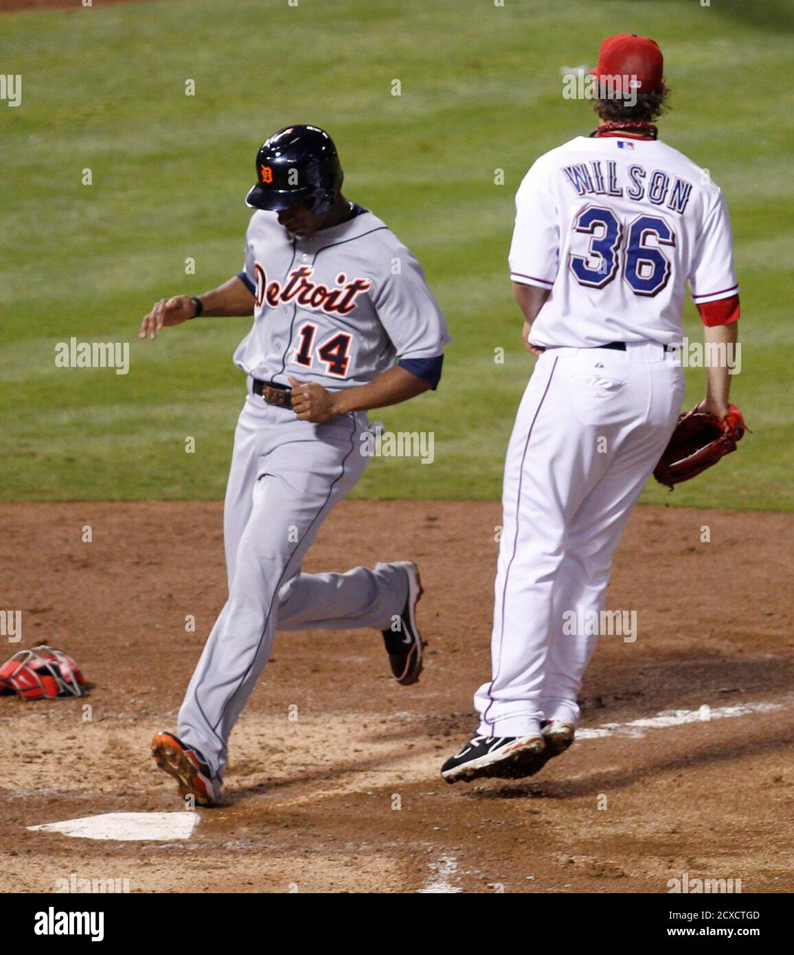 Detroit Tigers Austin Jackson L Scores From Third Base On A Wild Pitch From Texas Rangers Pitcher C J Wilson 36 In The Fifth Inning Of Game 1 Of The Mlb American League Detroit Tigers Austin Jackson L Scores From Third Base On A Wild Pitch From Texas Rangers Pitcher C J Wilson 36 In The Fifth Inning Of Game 1 Of The Mlb American League