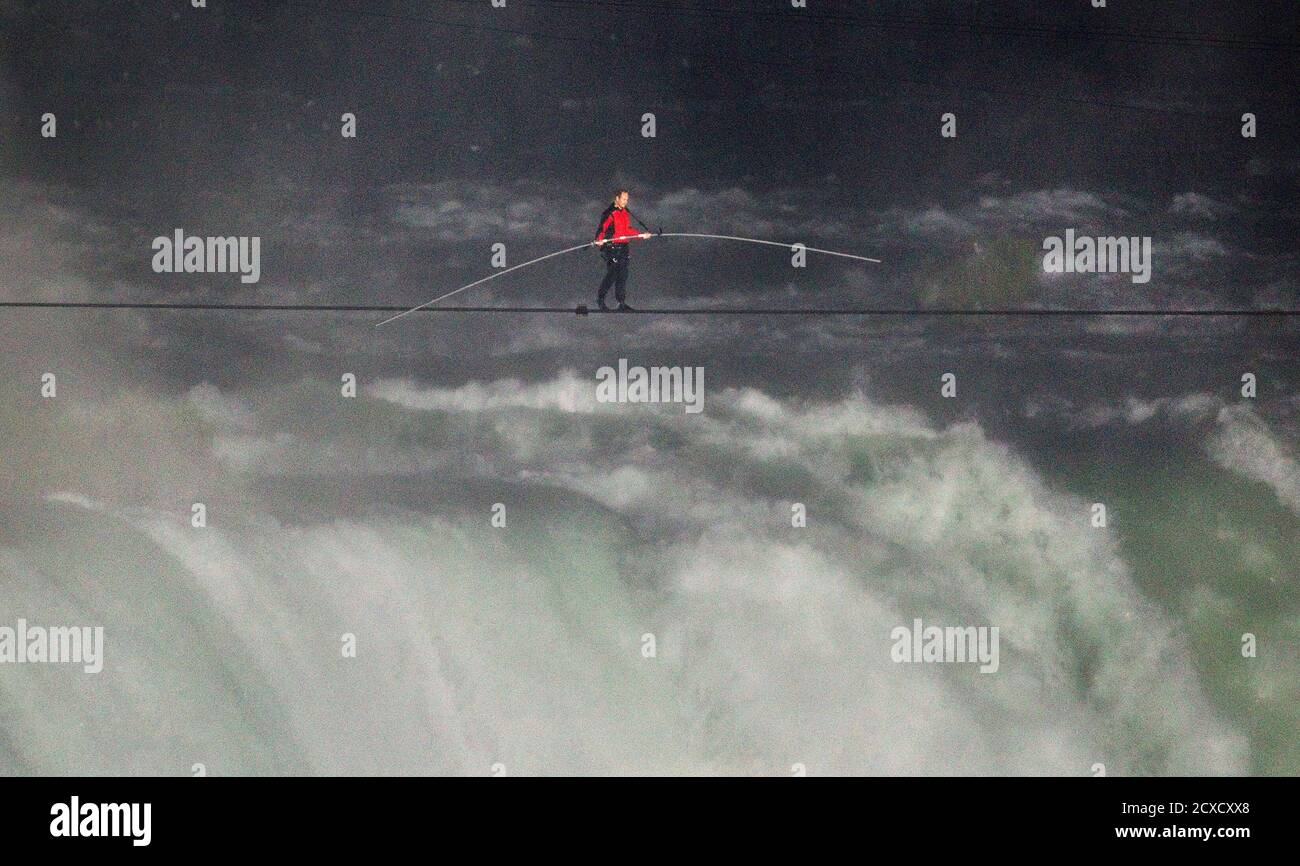 Tightrope walker Nik Wallenda walks the high wire from the U.S. side to the  Canadian side over the Horseshoe Falls in Niagara Falls, Ontario June 15,  2012. Wallenda, a member of the