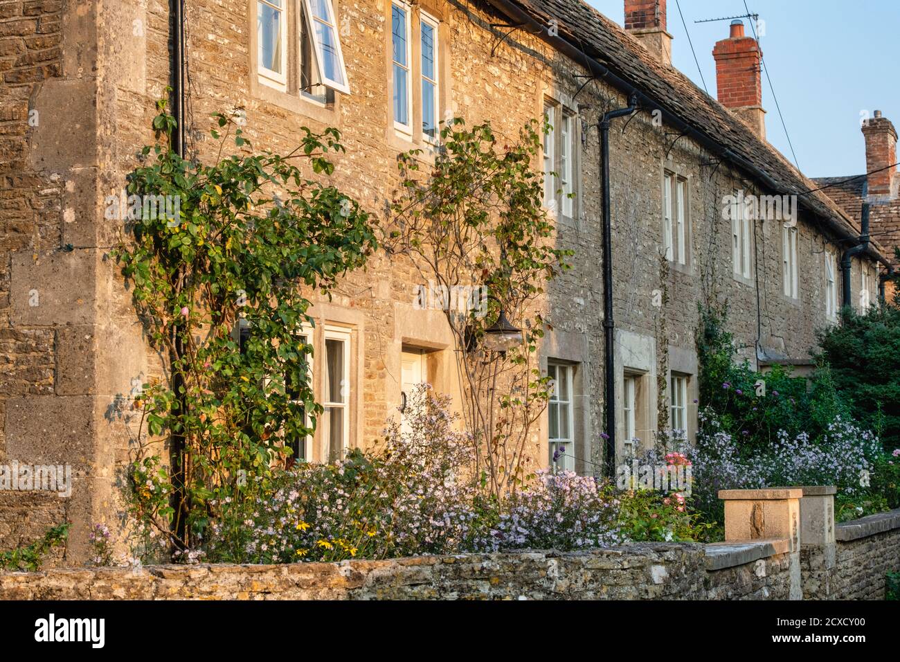 Row of cottages in a cotswold village in early autumn. Biddestone, Cotswolds, Wiltshire, England Stock Photo