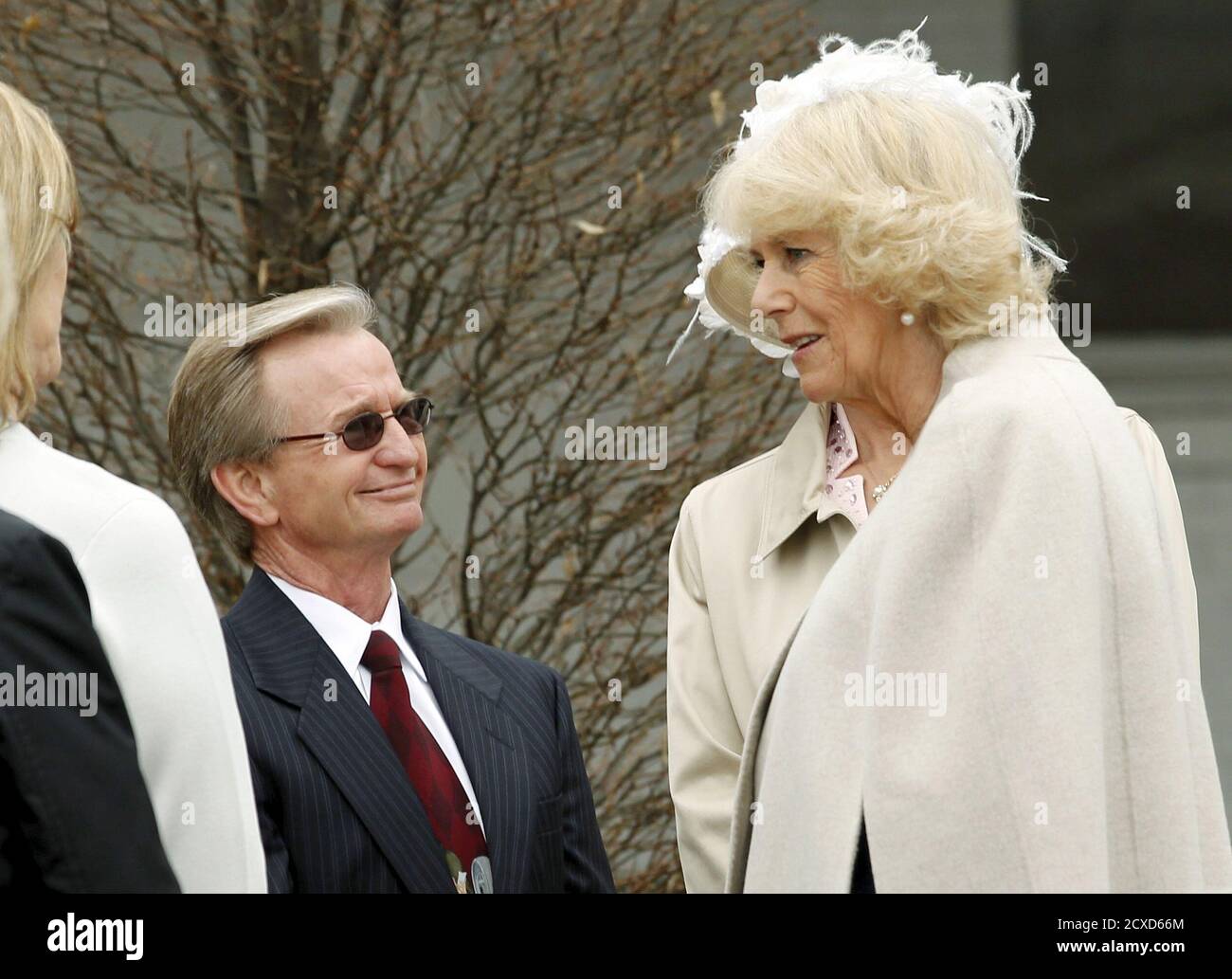 Camilla, Duchess of Cornwall (R) talks with Hall of Fame Jockey Pat Day (L)  at Churchill Downs, home of the Kentucky Derby horse race, during her visit  in Louisville, Kentucky March 20,