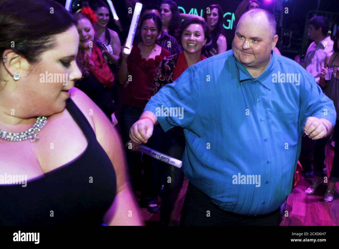 Television personality Whitney Thore and 'Dancing Man' Sean O'Brien dance at the #IAmDancingMan party at the Avalon Hollywood in Los Angeles, California May 23, 2015. O'Brien became a viral sensation in March after an internet user posted a photo intending to mock him that instead turned him into a hero for anti-bullying. REUTERS/Jonathan Alcorn Stock Photo