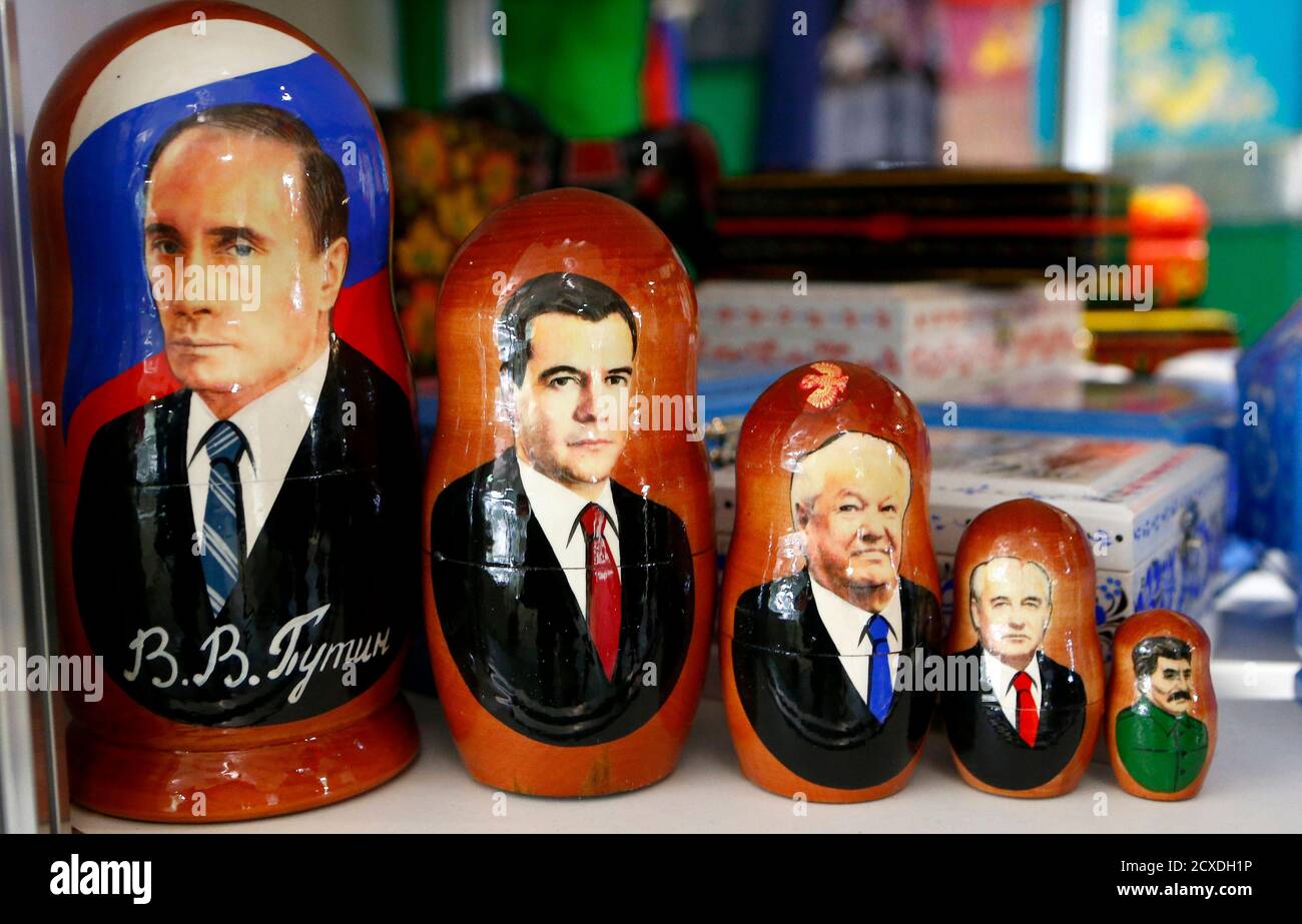 Painted Matryoshka dolls, or Russian nesting dolls, bearing the faces of  Russian President Vladimir Putin, Russian Prime Minister Dmitry Medvedev,  former Russian President Boris Yeltsin, former Soviet leader Mikhail  Gobachev and former