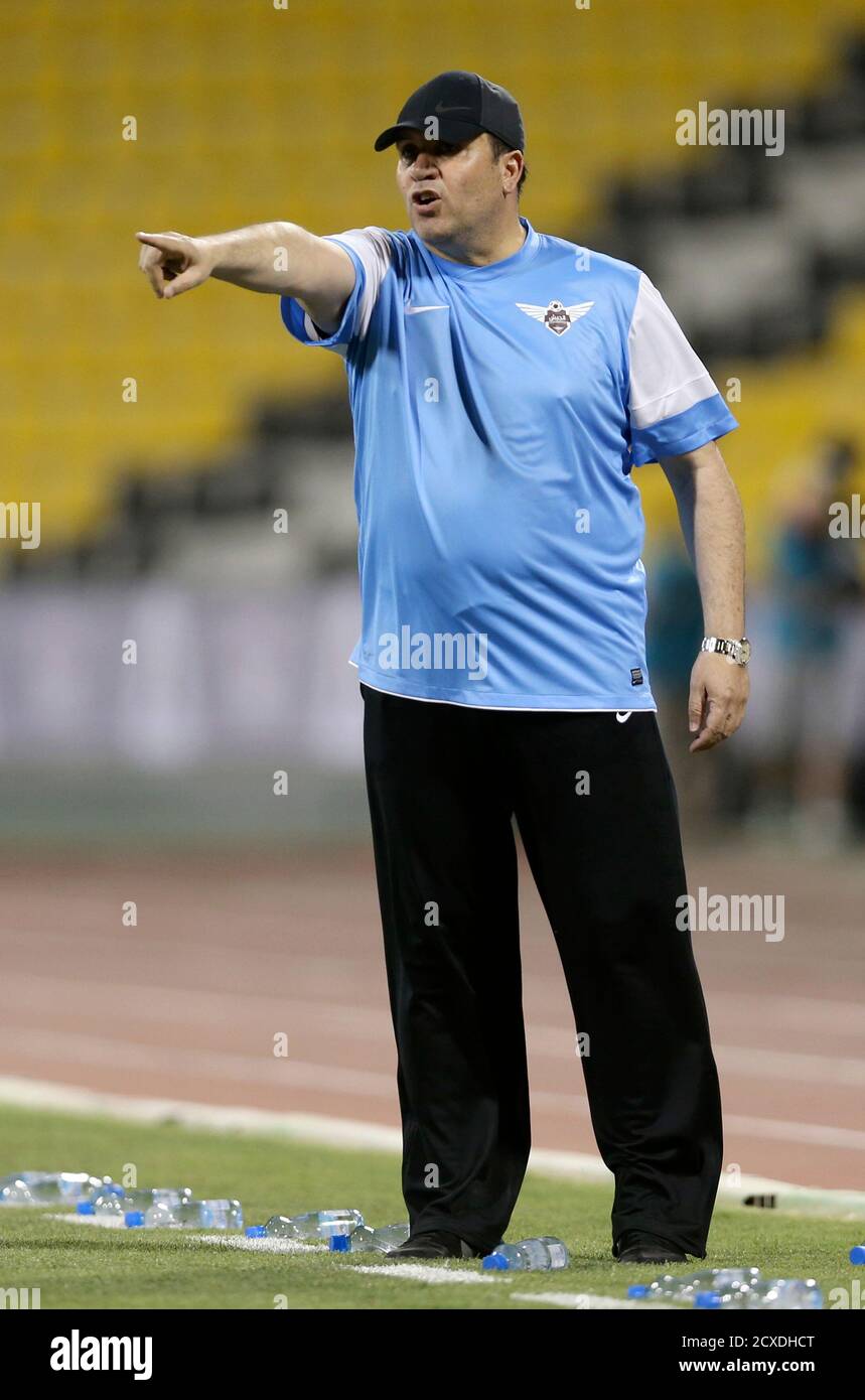 Qatar's ElJaish head coach Nabil Maaloul gestures during the Qatar Cup  semi-final soccer match against Al-Sadd in Doha, April 19, 2014.  REUTERS/Fadi Al-Assaad (QATAR - Tags: SPORT SOCCER Stock Photo - Alamy