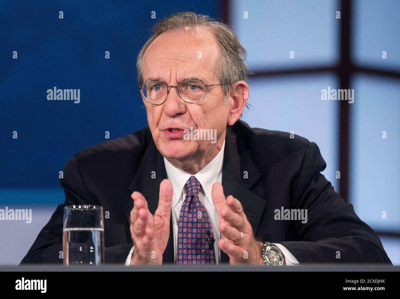 Italy's Minister of Economy and Finance Pier Carlo Padoan speaks during a discussion on 'A Reform Agenda for Europe's Leaders' during the World Bank/IMF annual meetings in Washington October 9, 2014.      REUTERS/Joshua Roberts    (UNITED STATES - Tags: POLITICS BUSINESS) Stock Photo