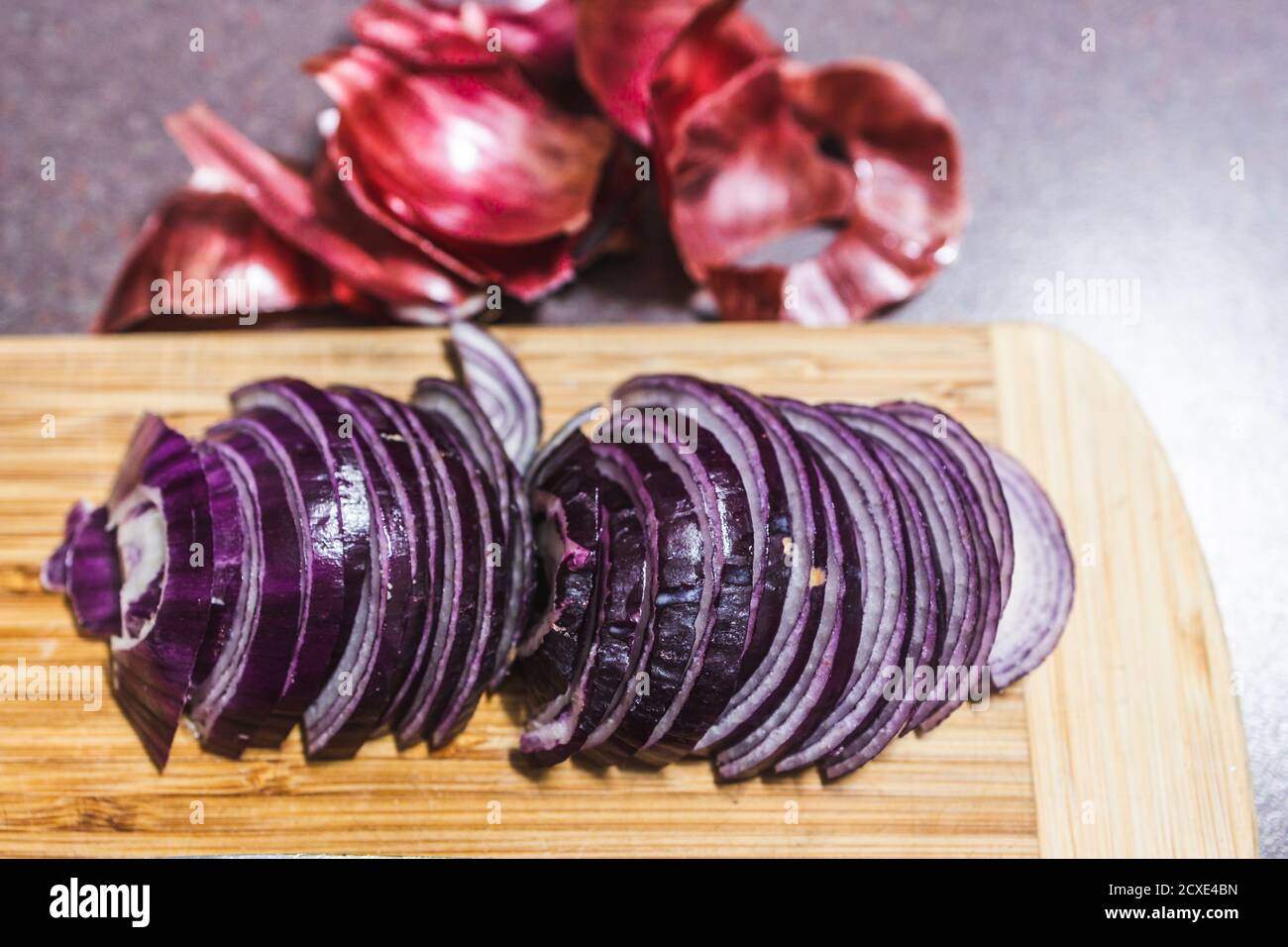 simple food ingredients concept, red spanish onion chopped into half