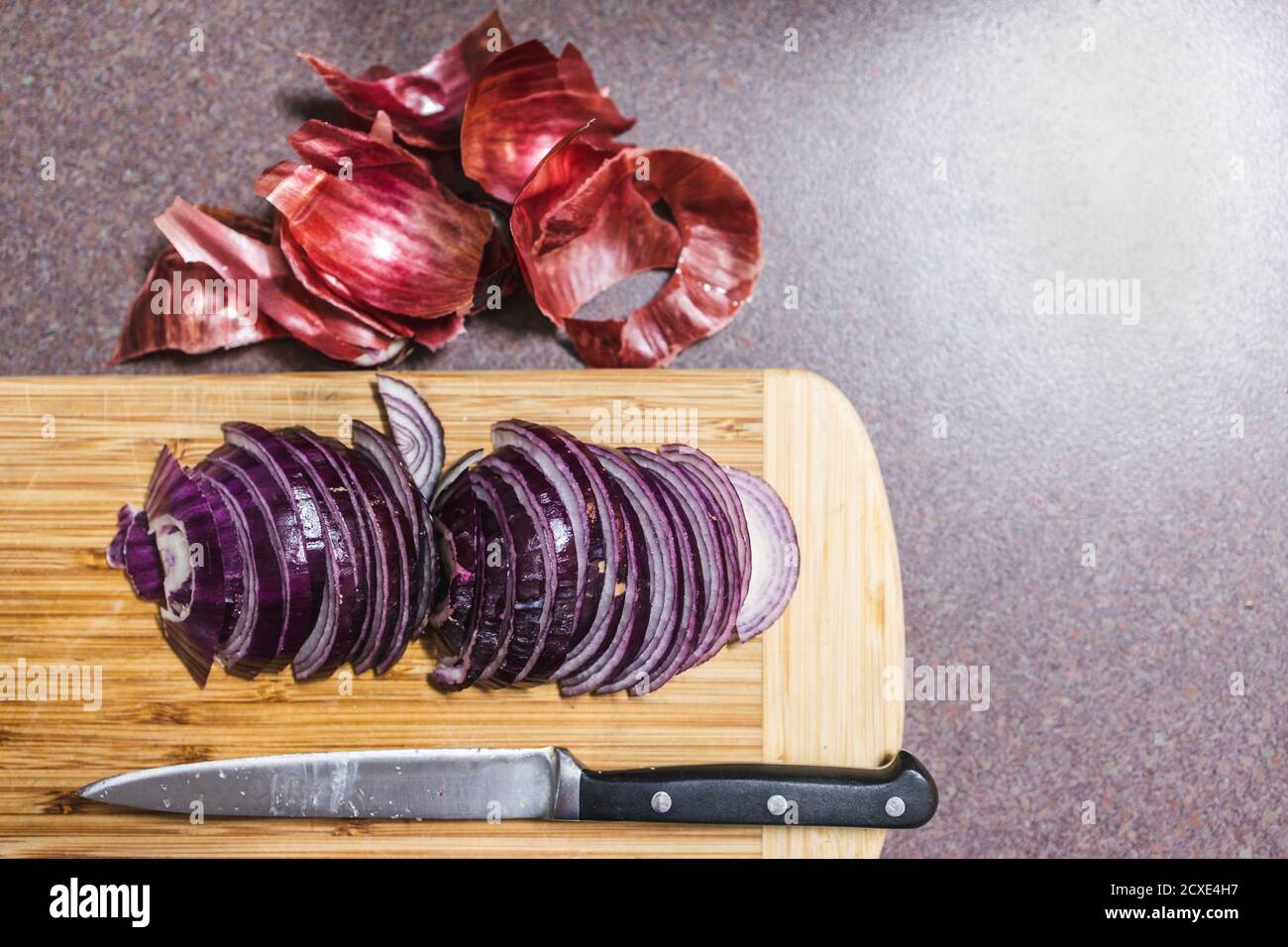 simple food ingredients concept, red spanish onion chopped into half