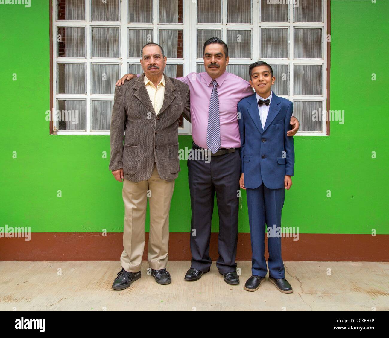 Hispanic Grandfather with Son and Grandson Family Portrait Stock Photo