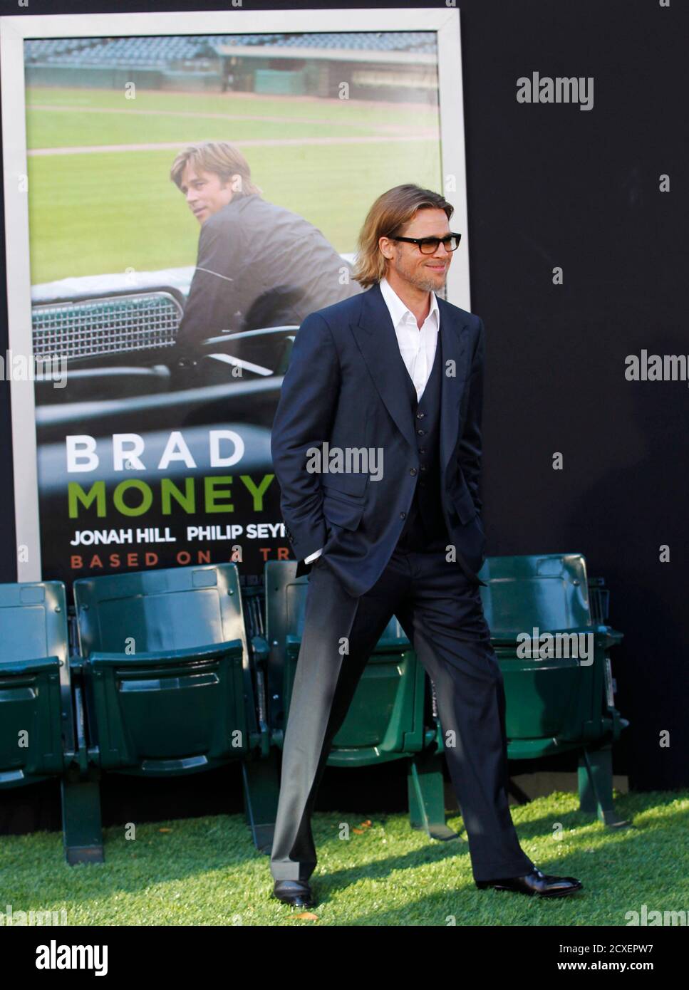 U.S. actor Brad Pitt, who stars as Oakland Athletics' general manager Billy  Beane, arrives for the world premiere of the film "Moneyball," in Oakland,  California September 19, 2011. REUTERS/Robert Galbraith (UNITED STATES -