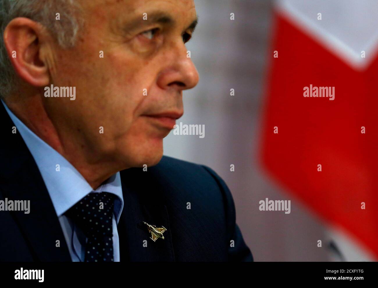 A Gripen fighter jet pin is pictured on the jacket of Swiss Defence  Minister Ueli Maurer during his address to the media during a news  conference after the Federal Council weekly meeting