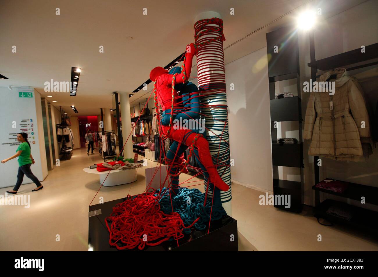 A Lana Sutra wool art installation is displayed at a Benetton store in  Istanbul September 13, 2011. Lana Sutra, a project by Cuban artist Erik  Ravelo for Benetton's communication research centre Fabrica,