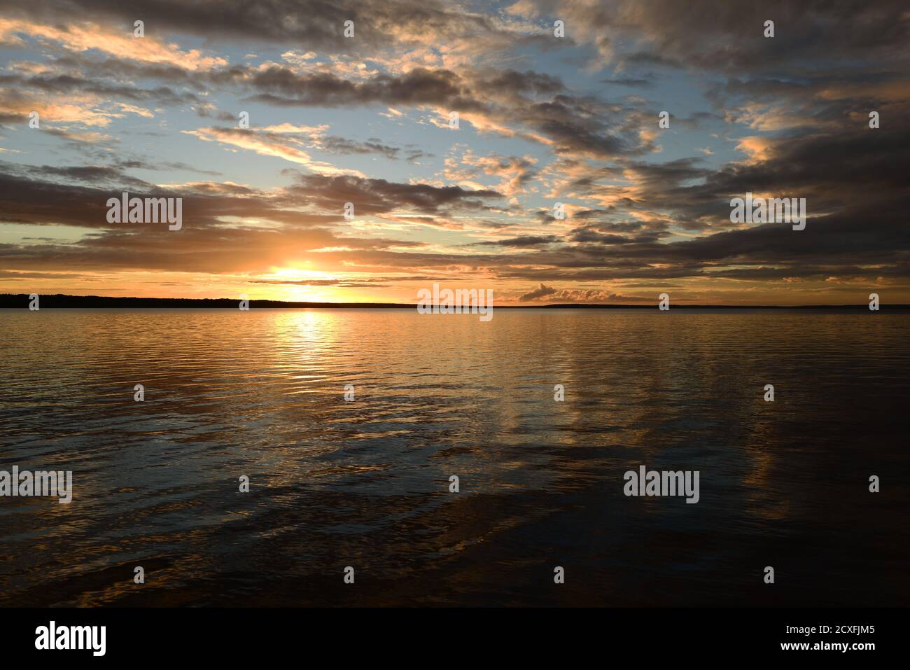 Reflection on water surface sunset hi-res stock photography and images ...