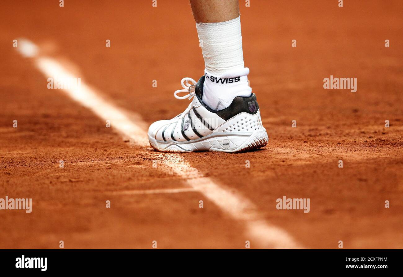 The shoe of U.S. Davis Cup team member Mardy Fish with the writing 'K-Swiss'  on the sock is pictured during a practice session in Fribourg, February 8,  2012. The U.S. will meet