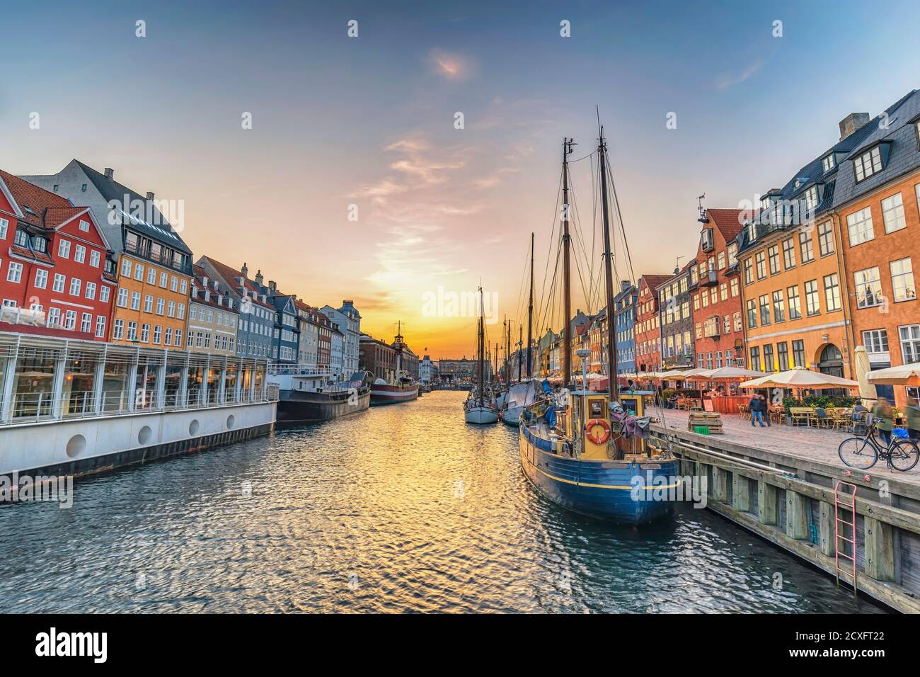 Copenhagen Denmark, sunset city skyline at Nyhavn harbour with colourful house Stock Photo