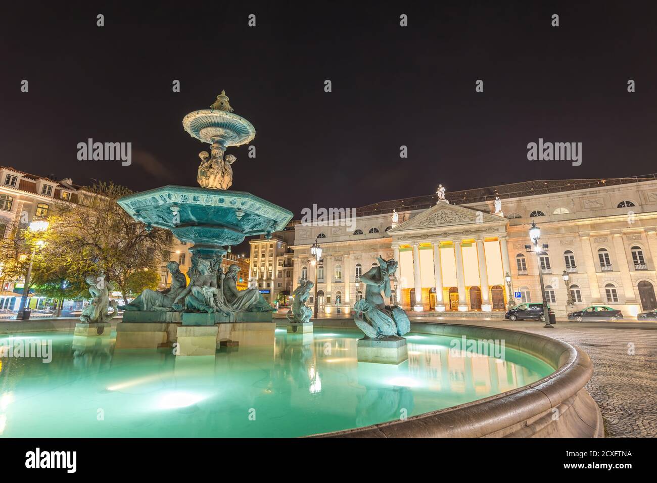 Lisbon Portugal night city skyline at Lisbon Rossio Square Stock Photo